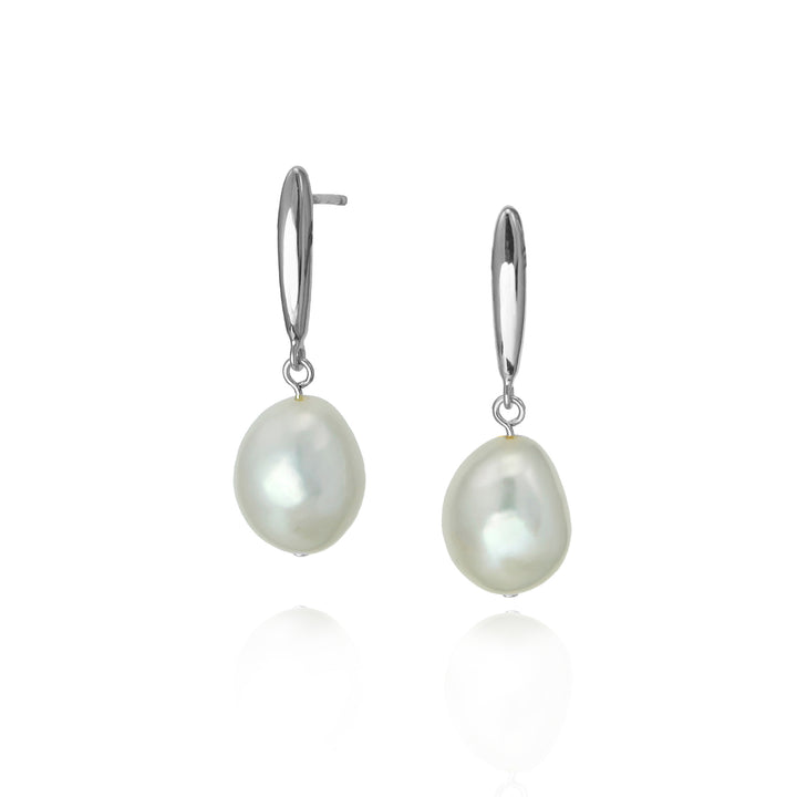 Freshwater pearl drop earrings in silver against a white background