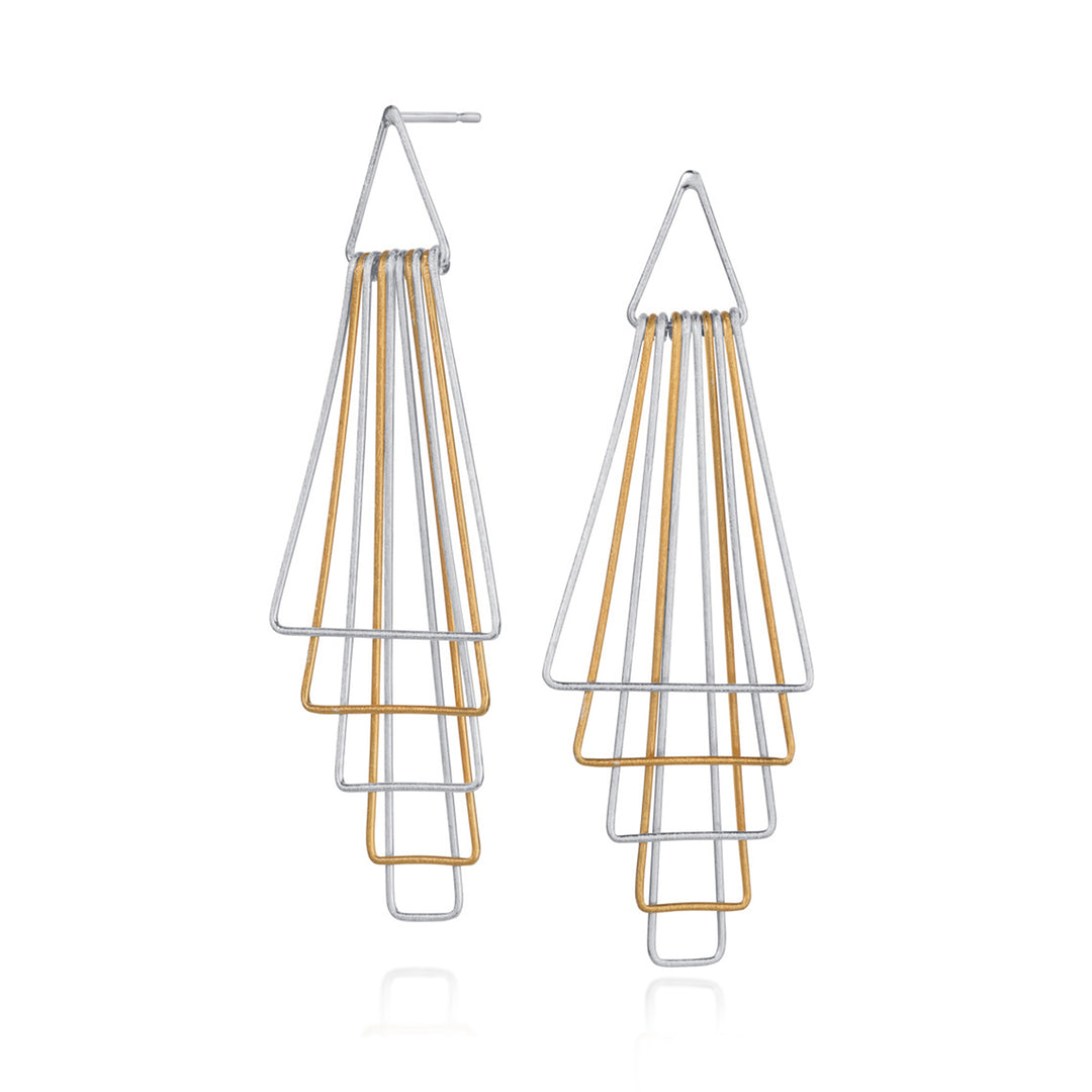 Pair of geometric earrings with gold and silver design on a white background