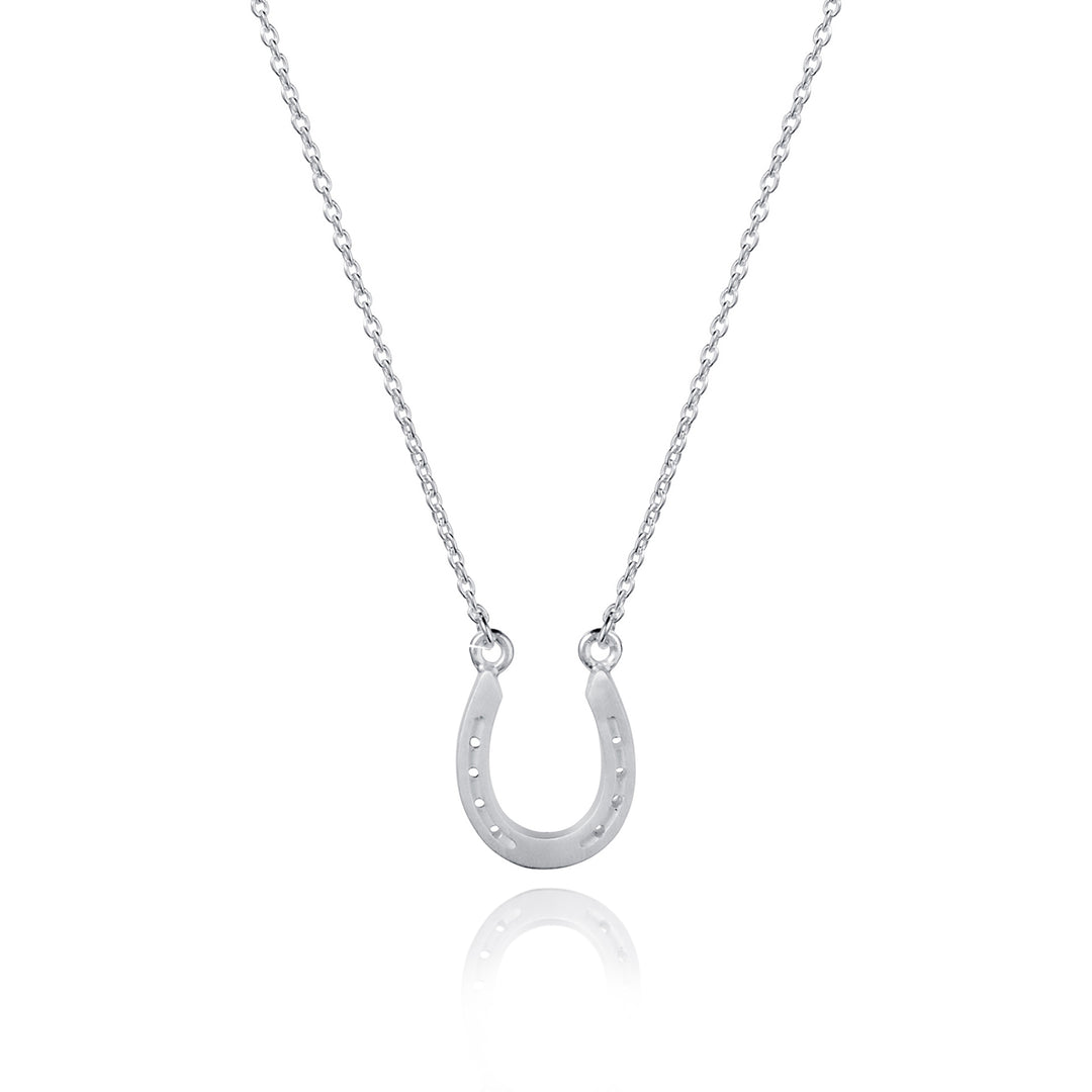 Silver horseshoe necklace on a white background