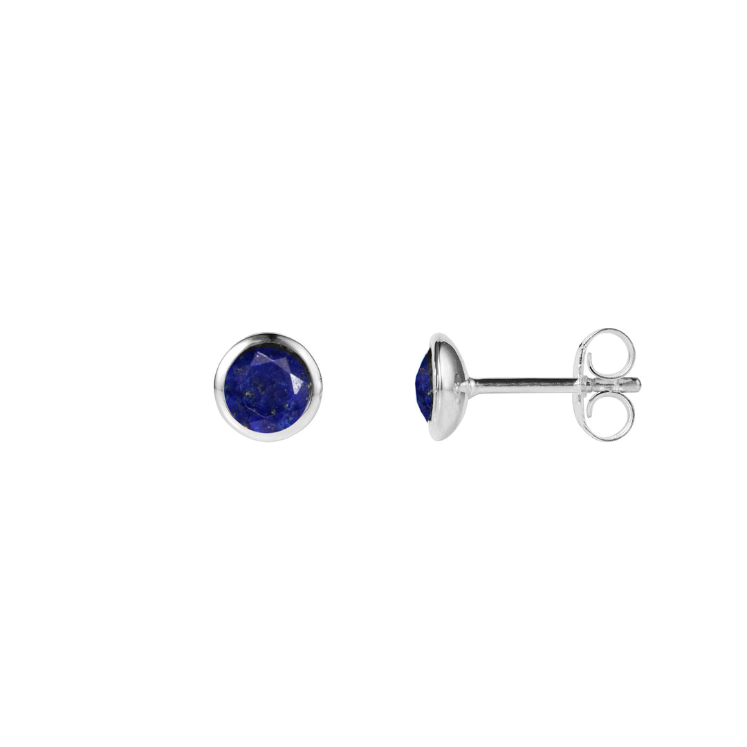 Pair of silver post earrings with blue lapis lazuli gemstones on a white background