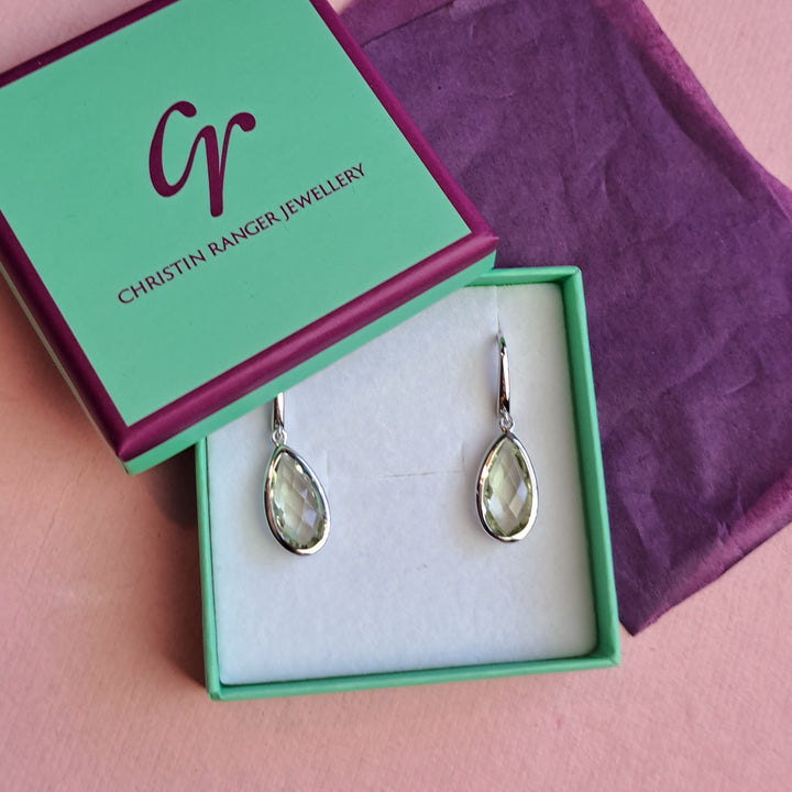 Sterling silver pear drop earrings with green amethyst in Christin Ranger Jewellery gift packaging