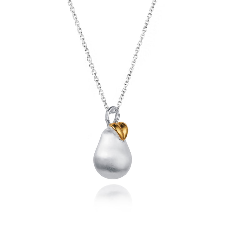 a silver pear pendant with gold leaf on a silver chain against a white background