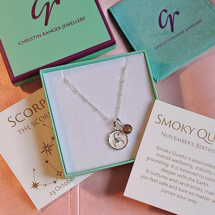 Silver zodiac zodiac pendant and smoky quartz  birthstone charm with Christin Ranger Jewellery packaging