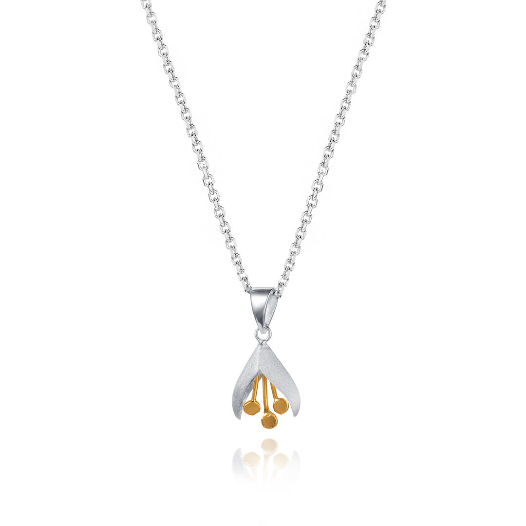 Silver necklace with a unique flower pendant on a white background