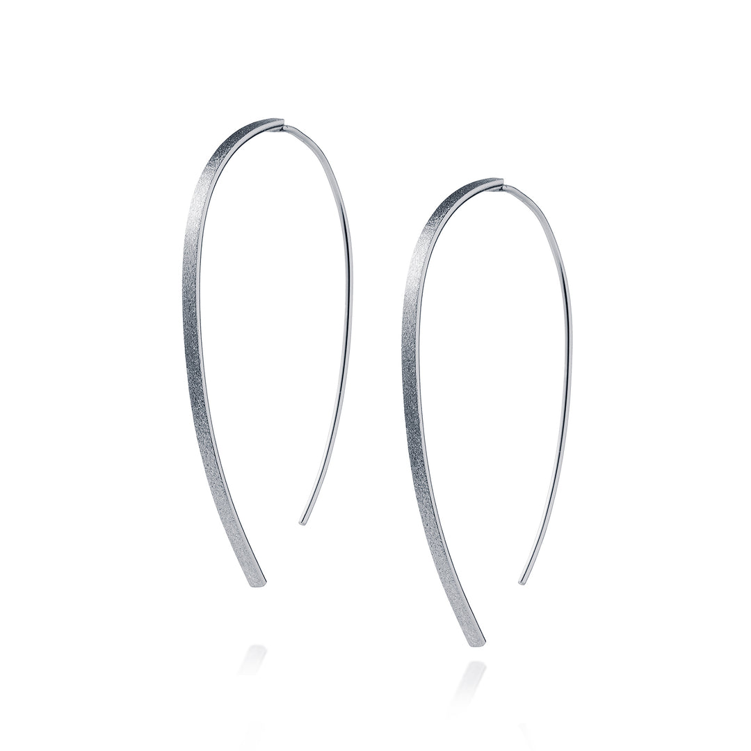 Pair of silver wishbone threader earrings on a white background