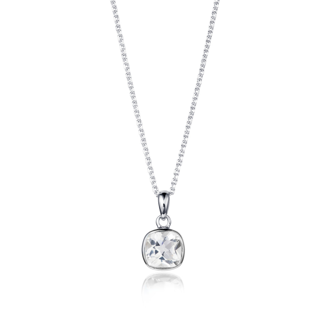 Silver necklace with a square white topaz gemstone on a white background