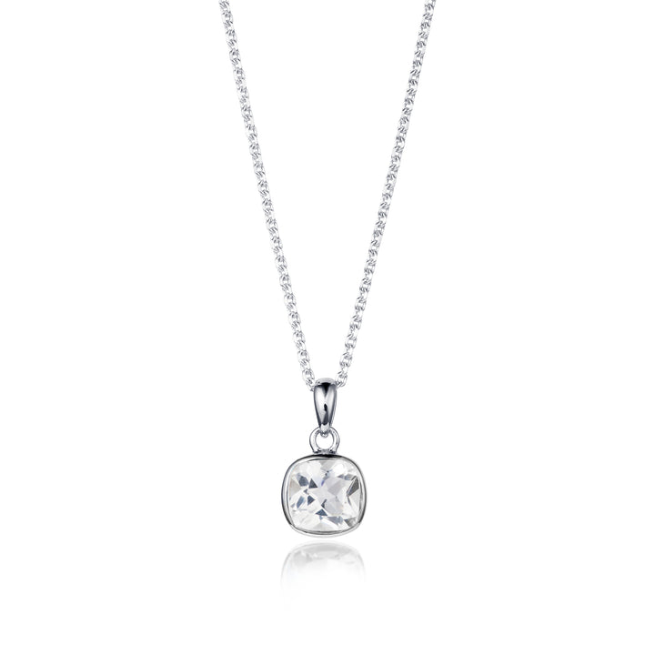 Silver necklace with a square white topaz gemstone on a white background