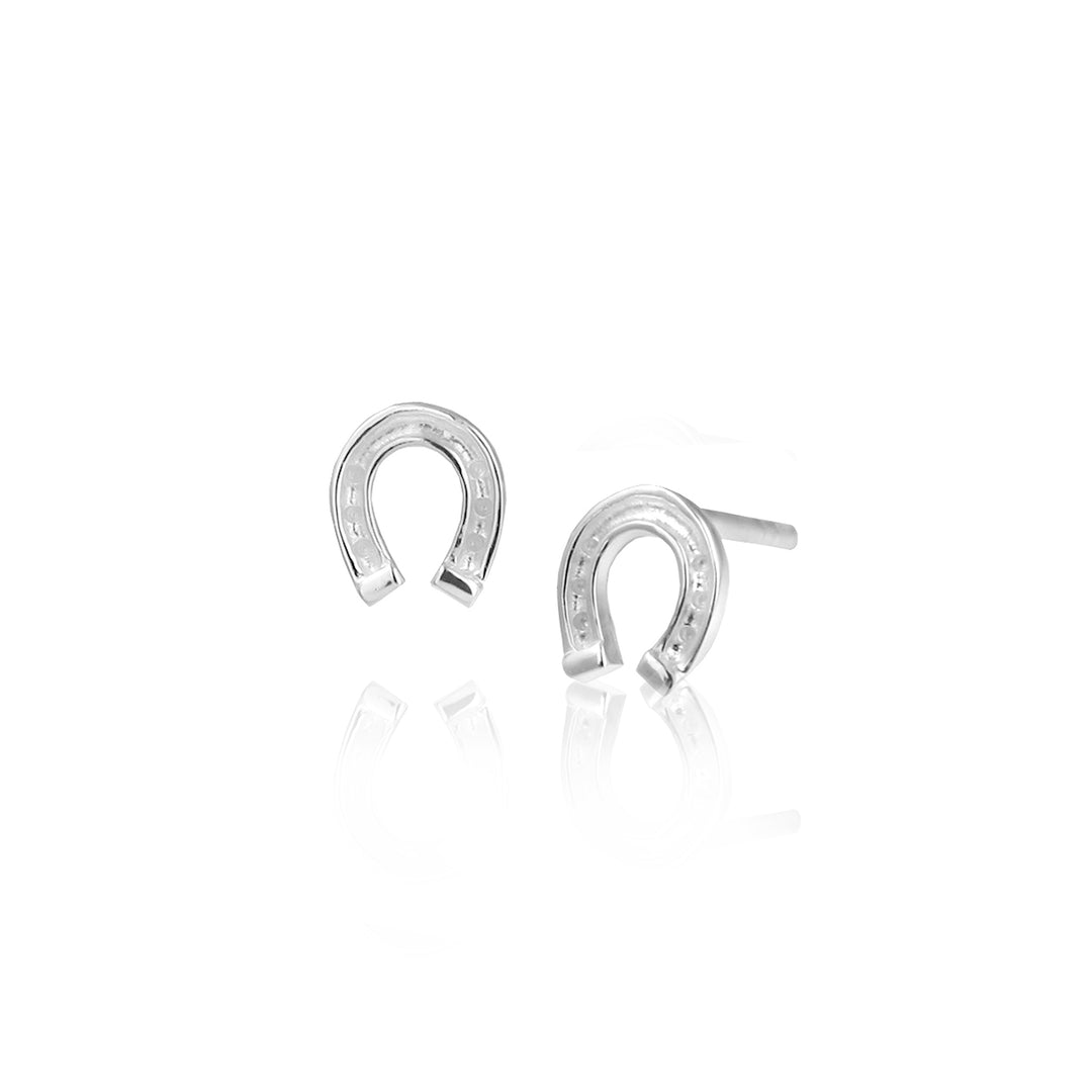 Silver horseshoe earrings on a white background