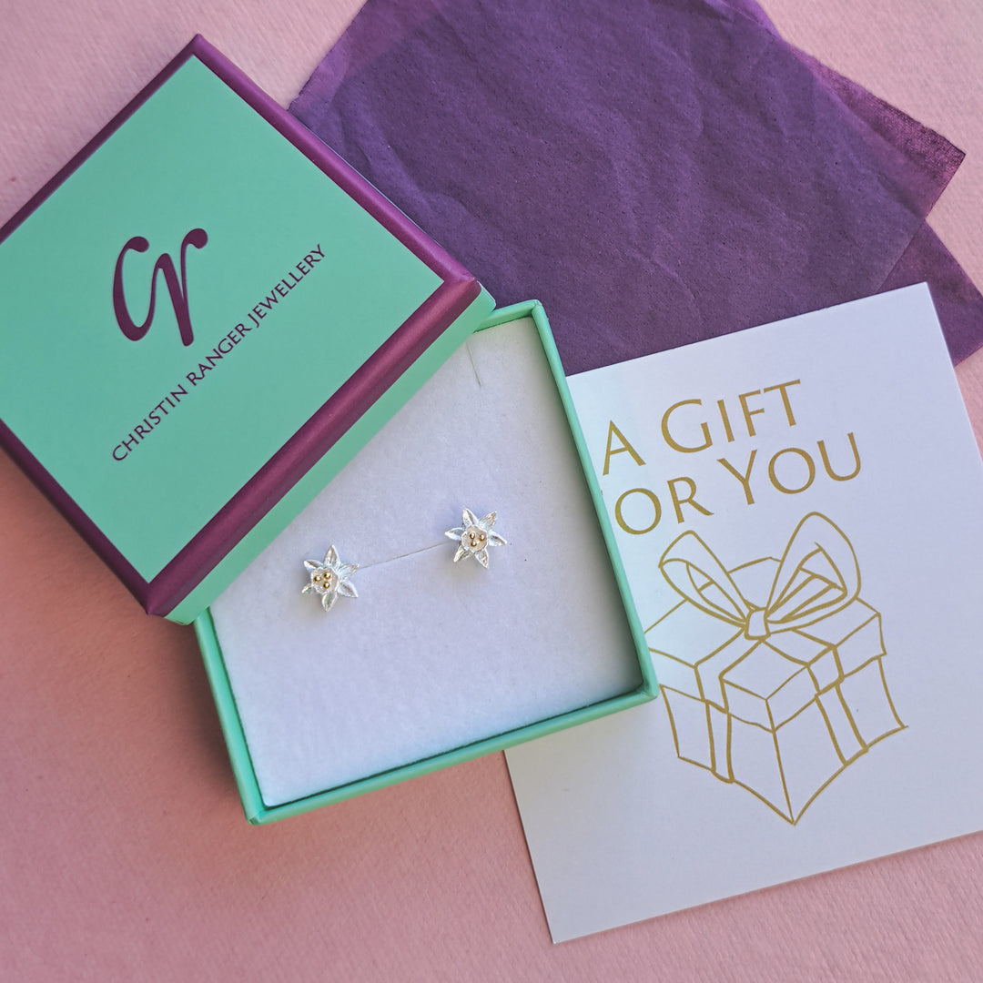 Sterling silver daffodil stud earrings in Christin Ranger gift packaging