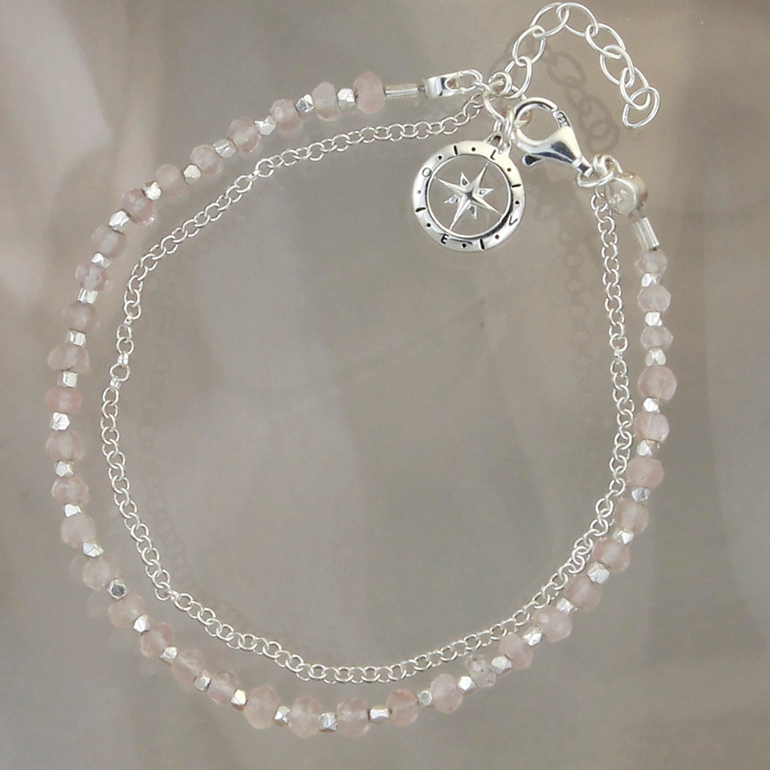 Sterling silver moonstone beaded bracelet and chain with a compass charm.