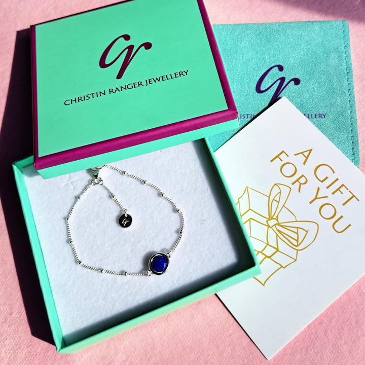 Sterling silver beaded chain bracelet with lapis lazuli in a Christin Ranger gift box with card