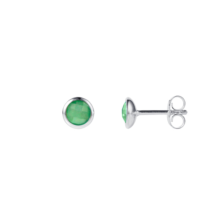 Dainty silver stud earrings with green gemstones on a white background