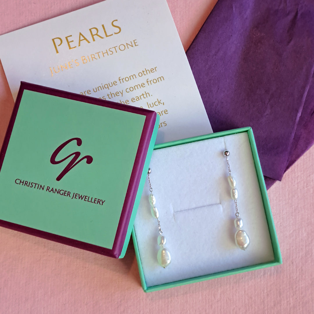 Sterling silver freshwater pearl drop stud earrings in Christin Ranger Jewellery gift packaging