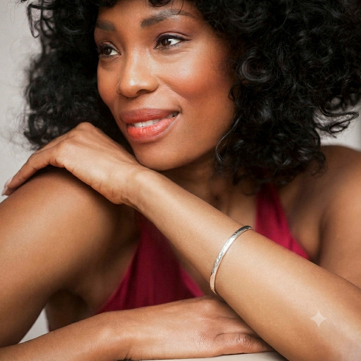 Woman wearing a Sterling Silver Hammered Bangle