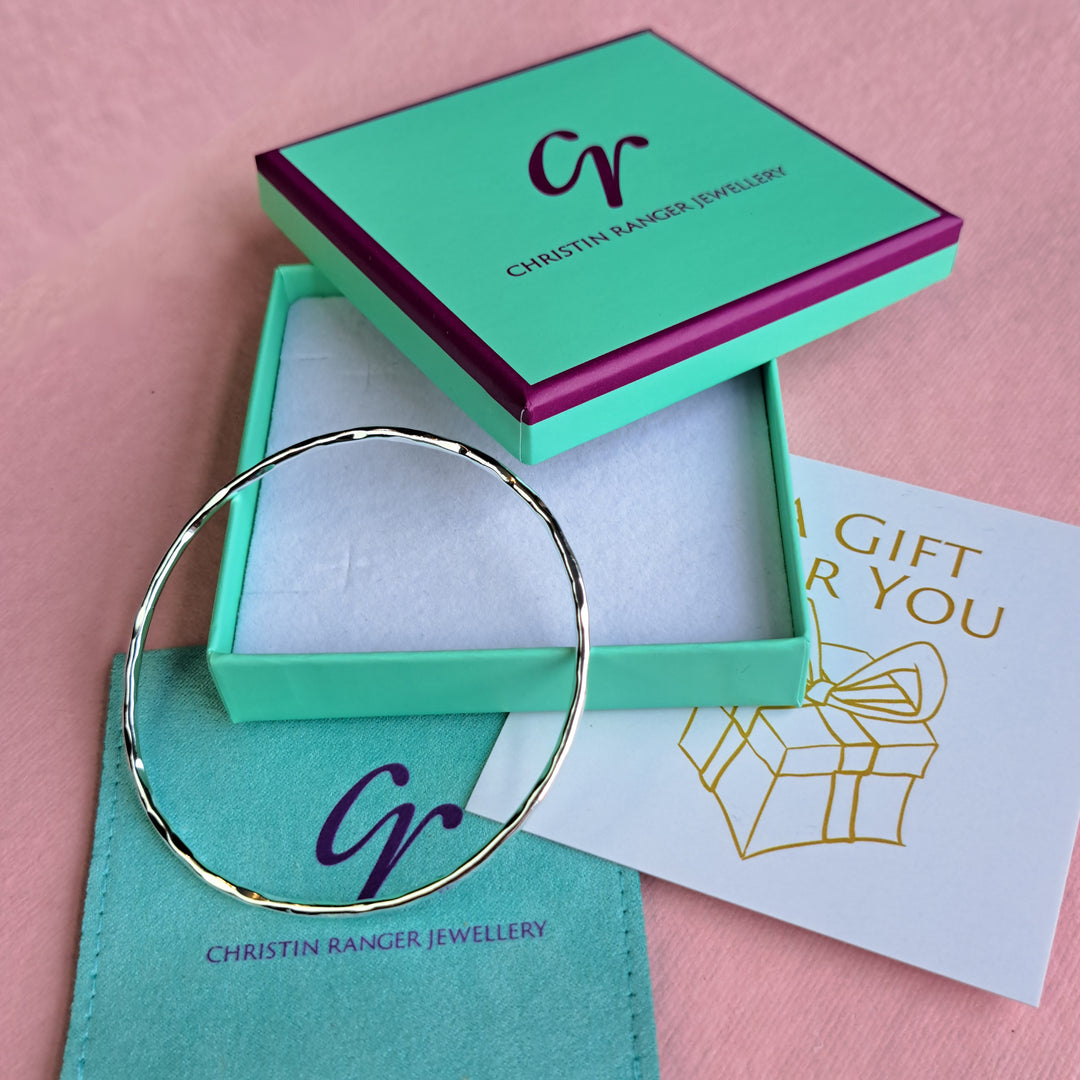 Sterling silver hoola hoop bangle in a Christin Ranger gift box with card and pounch