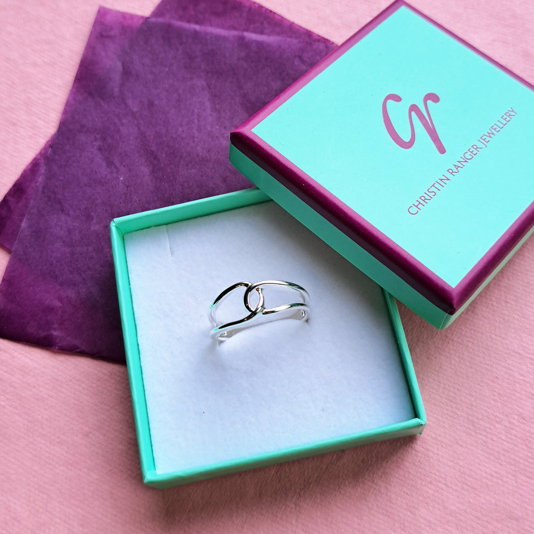 Sterling silver interlocking loop ring in Christin Ranger Jewellery  gift packaging