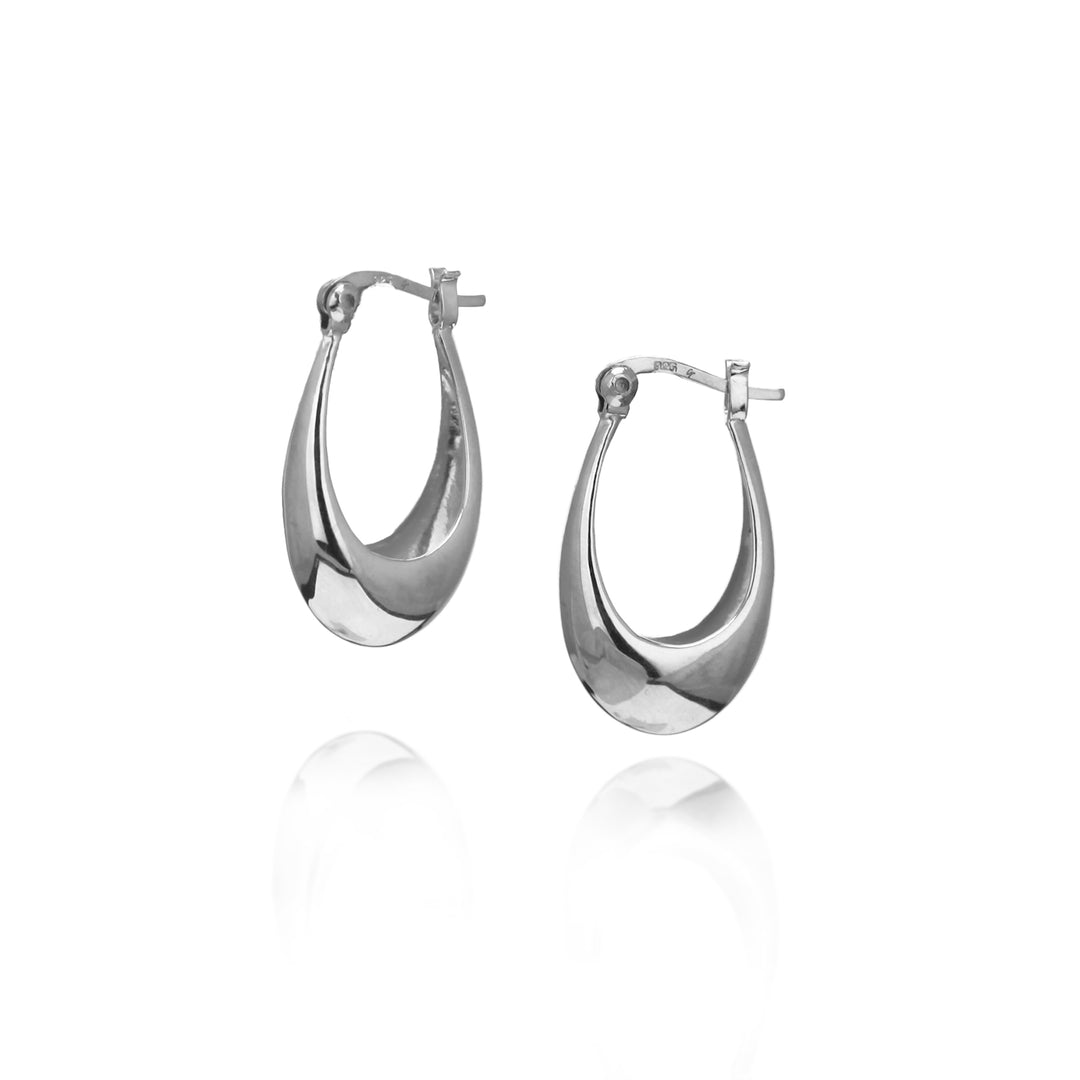 Pair of oval sterling silver hoop earrings on a white background