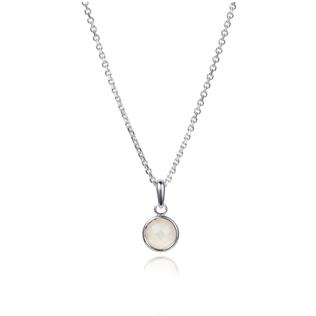 Dainty silver necklace and chain set with a  faceted moonstone gemstone.