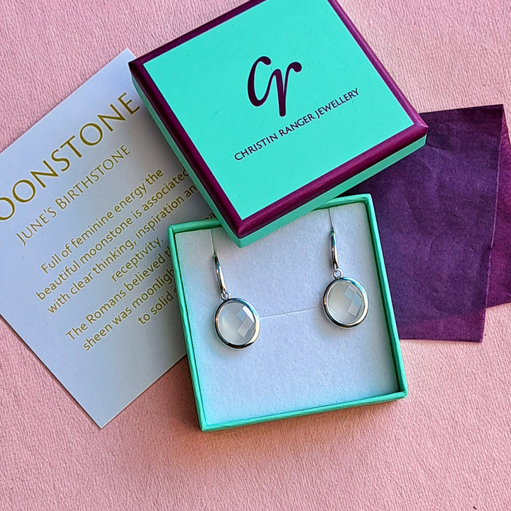 Sterling silver oval white moonstone drop earrings in Christin Ranger Jewellery gift packaging