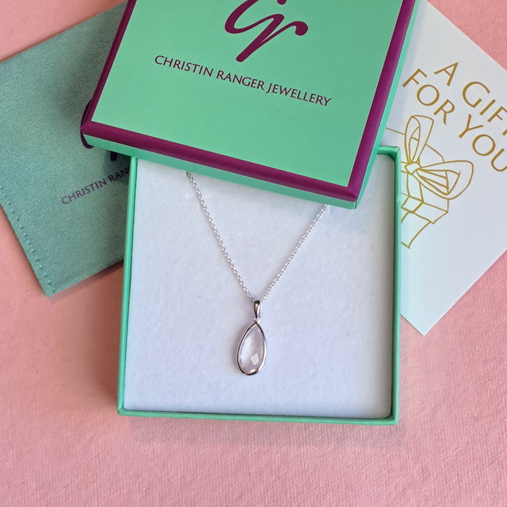 Sterling silver pear drop pendant necklace with rose quartz in Christin Ranger Jewellery gift packaging