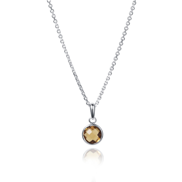Small round silver necklace set with a smoky quartz gemstone on a white background