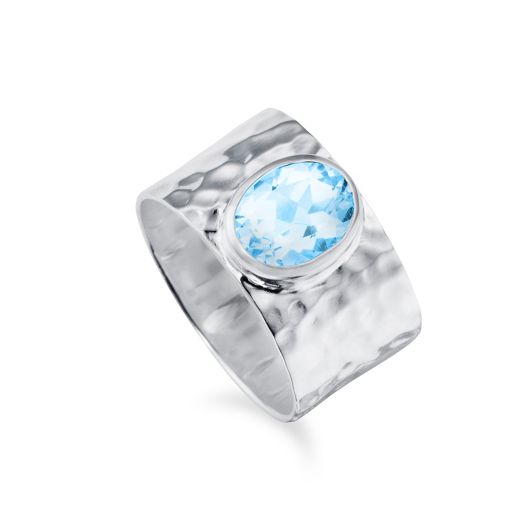Sterling silver wide band ring with natural blue topaz gemstone