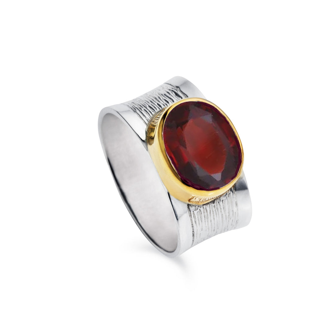 Wide band silver ring with a large red garnet gemstone with gold vermeil
