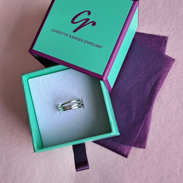 Sterling silver wrap ring in gift packaging