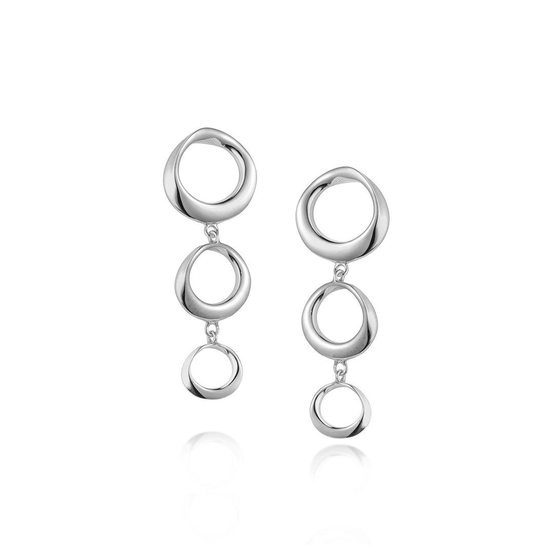 Pair of silver three ring post earrings on a white background