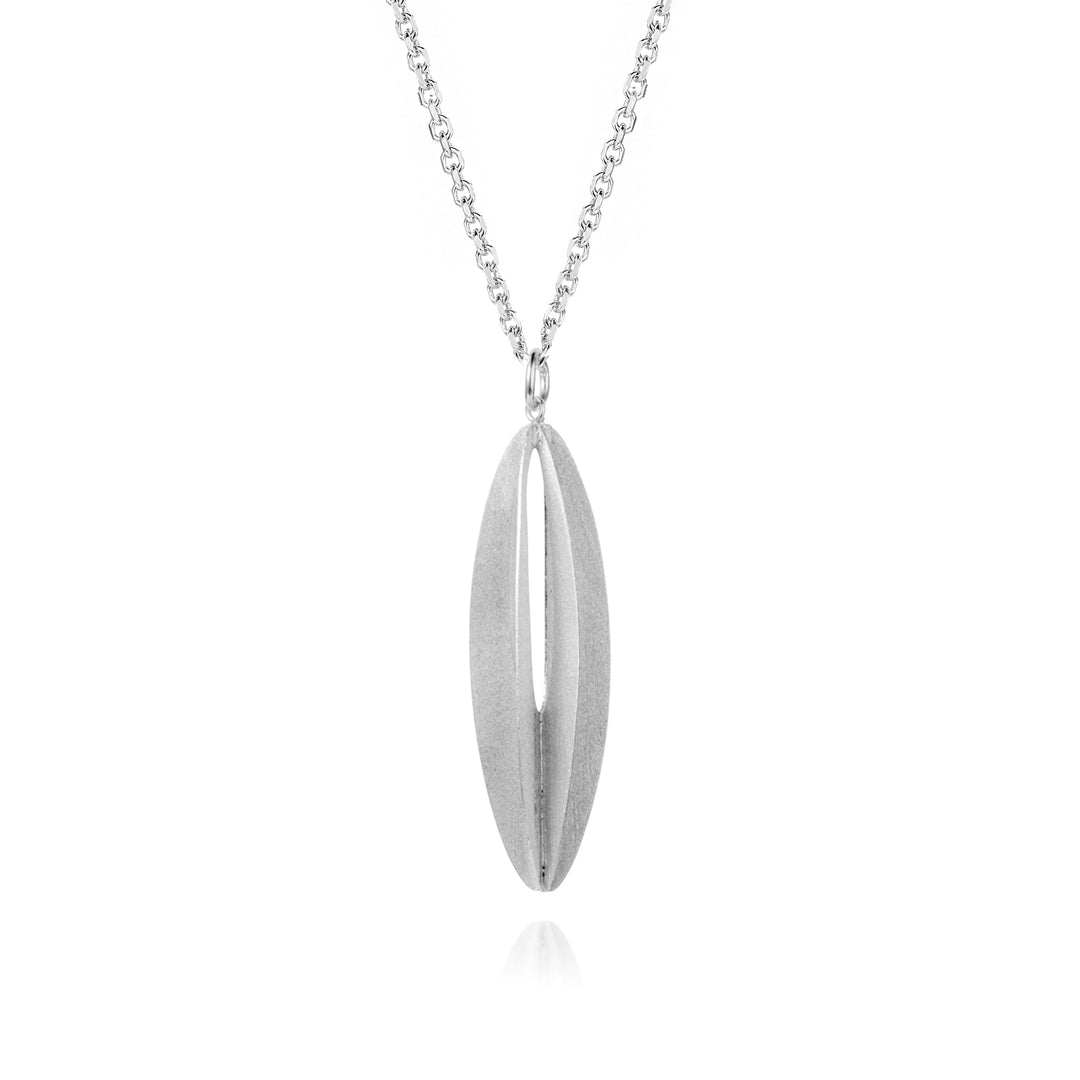 Silver elliptical shaped necklace on a white background