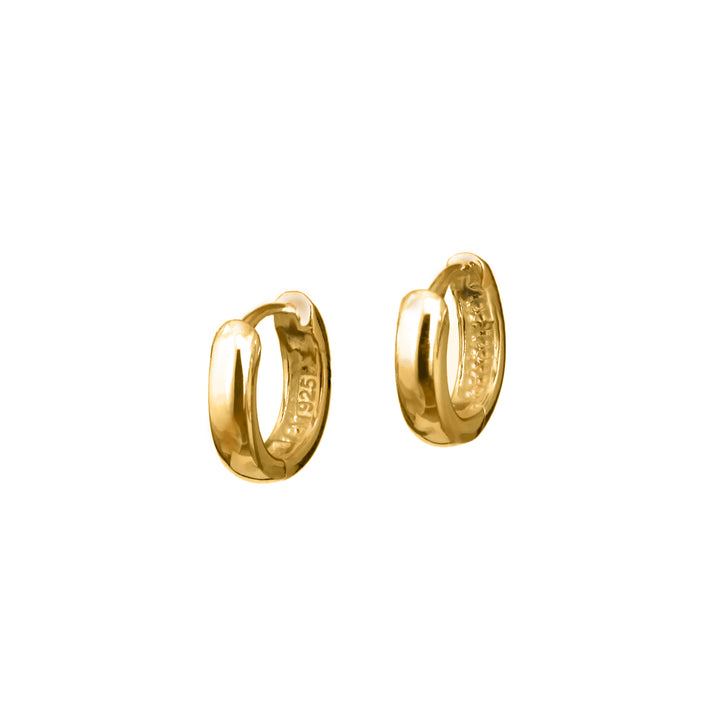 A pair of small gold hoop earrings with a click hinge, displayed against a white background.