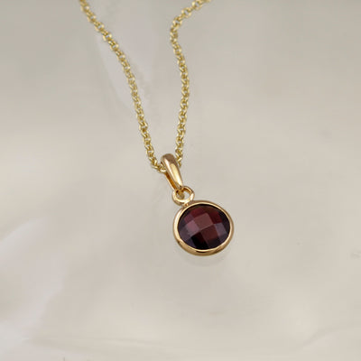 Image of Gold and Red Garnet Pendant Necklace