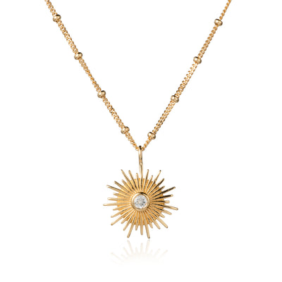Photo of Gold and White Topaz Sun Necklace