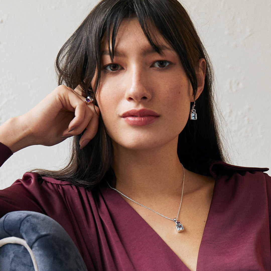 Model Wearing Blue Topaz & Amethyst Silver Pendant