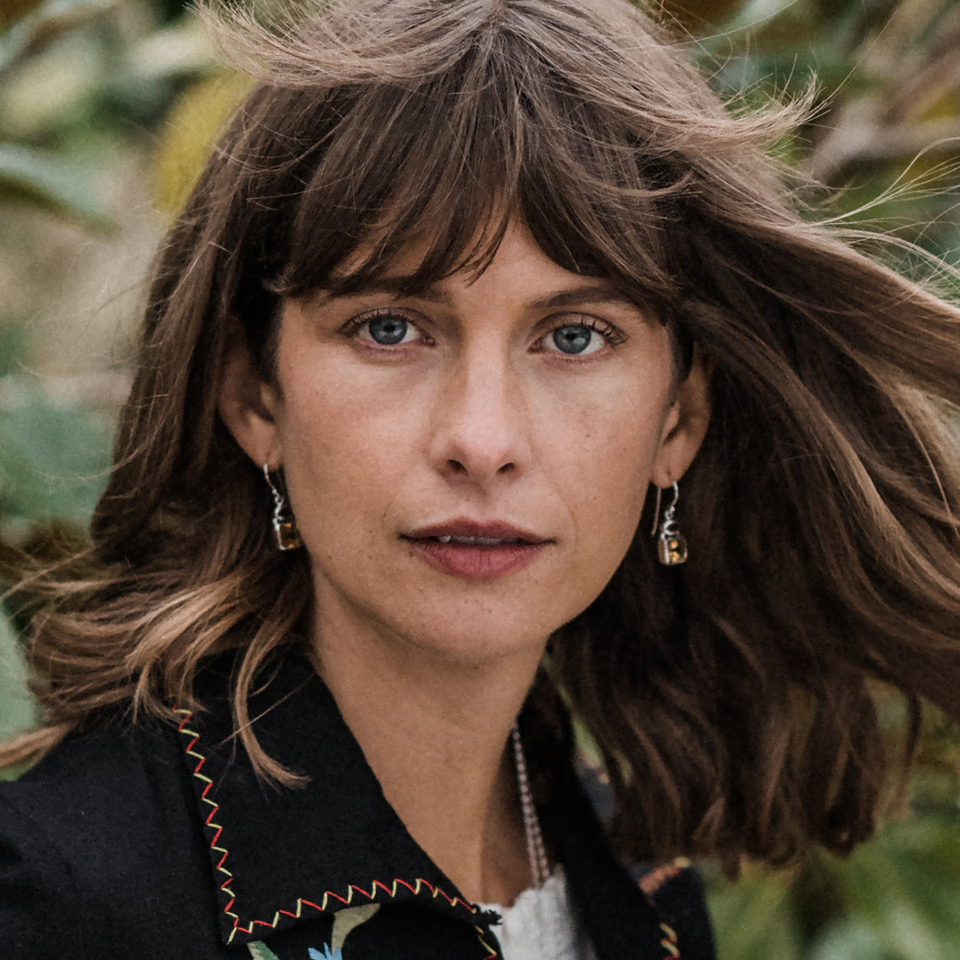 Model Wearing Silver, Citrine and Garnet Earrings