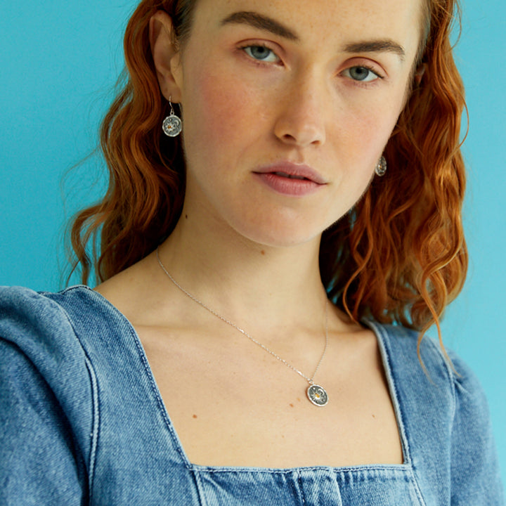 Model Wearing Heaven-Sent Sun & Moon Pendant in Matte Silver