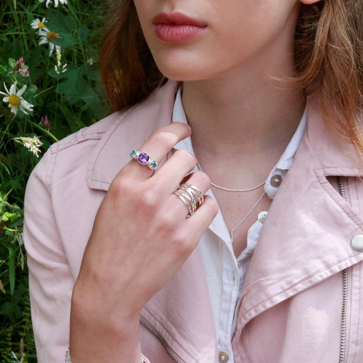 Model Wearing Lilac Blue Topaz and Amethyst Silver Ring