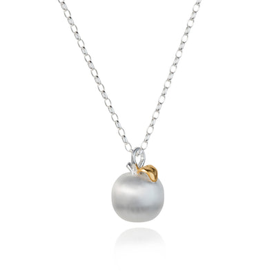 Photo of Silver and Gold Apple Pendant