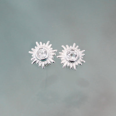 Photo of Silver and White Topaz Sun Stud Earrings