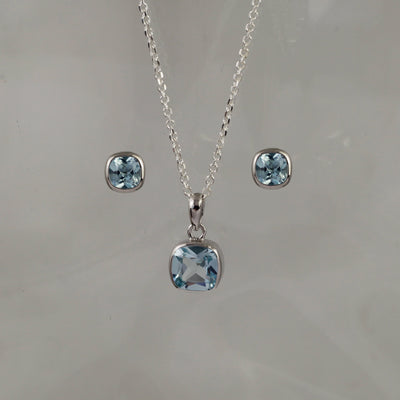 Image of Blue Topaz Pendant and Stud Earrings