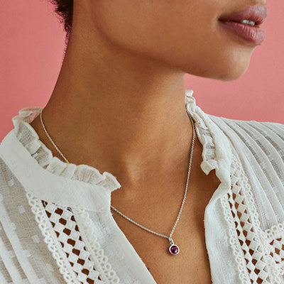 Model Wearing Silver and Ruby Maya Pendant Necklace