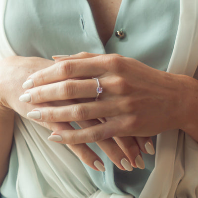 Model Wearing Silver and Opal Ring