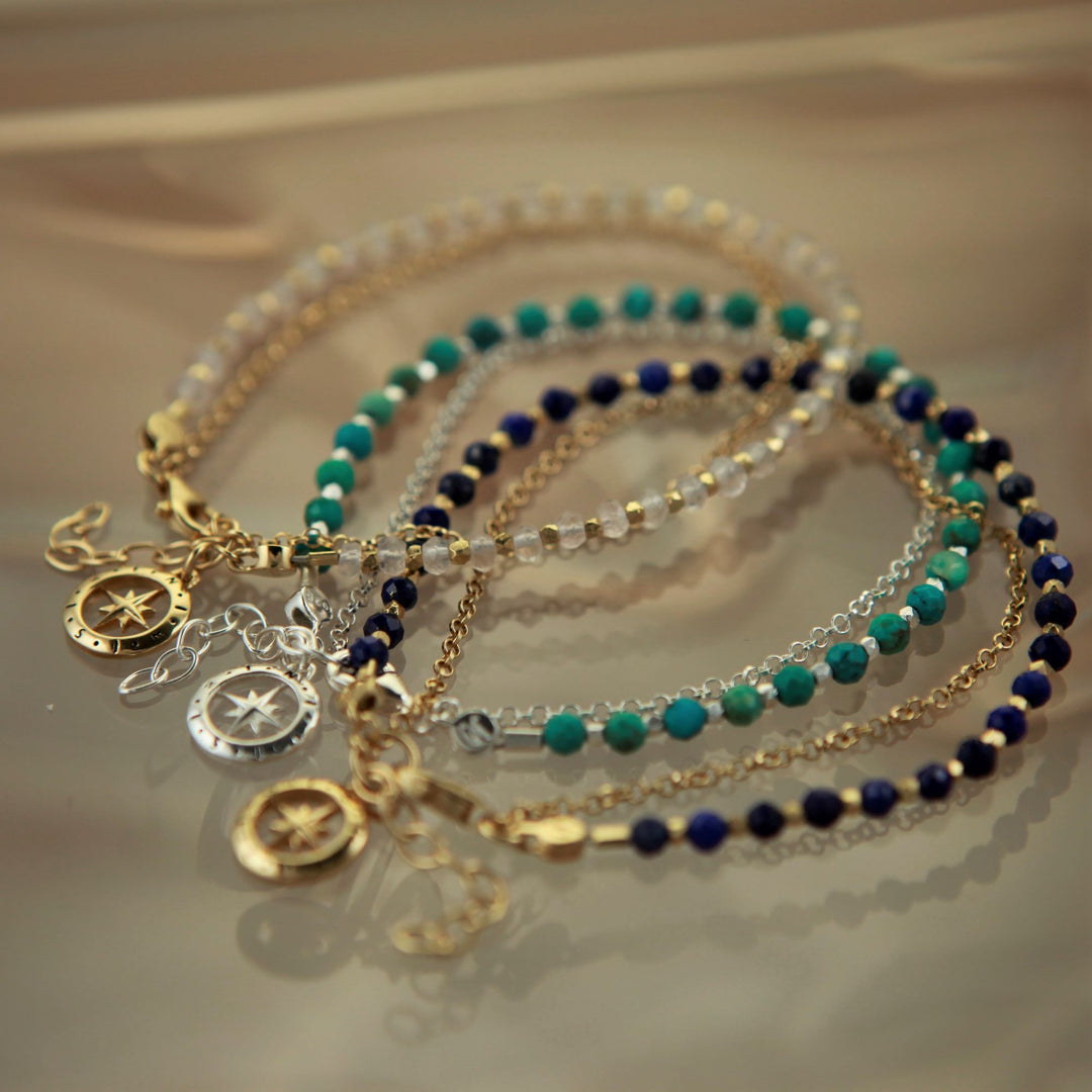 Image of three gold vermeil and silver beaded bracelets with moonstone, lapis lazuli and turquoise gemstones. 