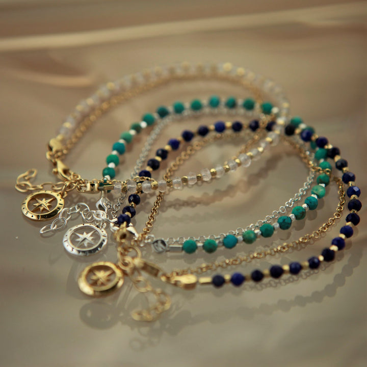 Image of three gold vermeil and silver beaded bracelets with moonstone, lapis lazuli and turquoise gemstones. 