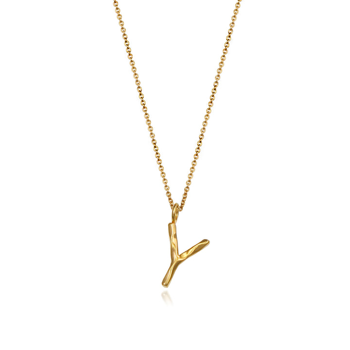 Gold vermeil letter Y initial necklace pendant with chain on a white background.
