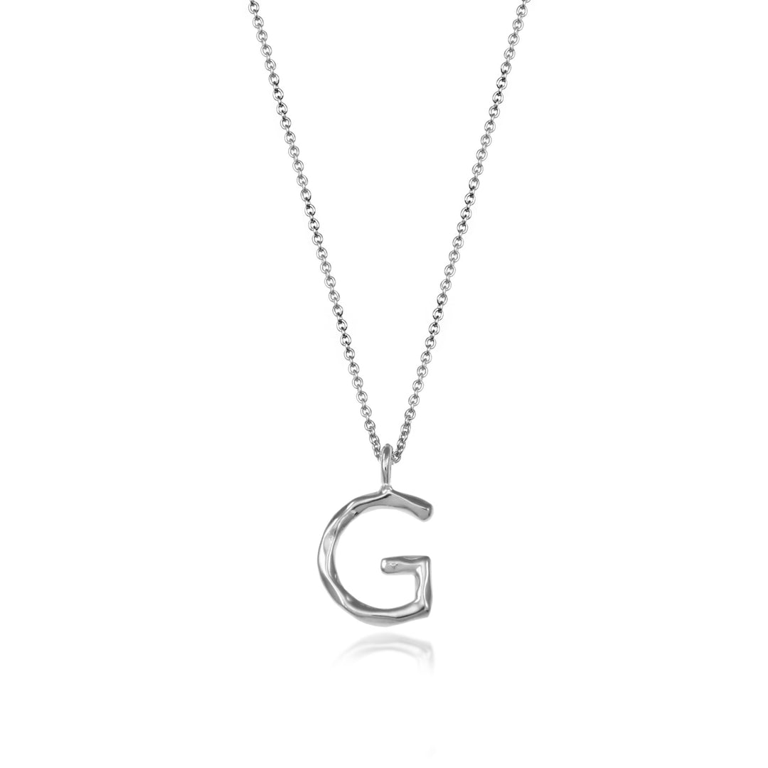 Sterling silver letter G initial necklace pendant with chain on a white background.