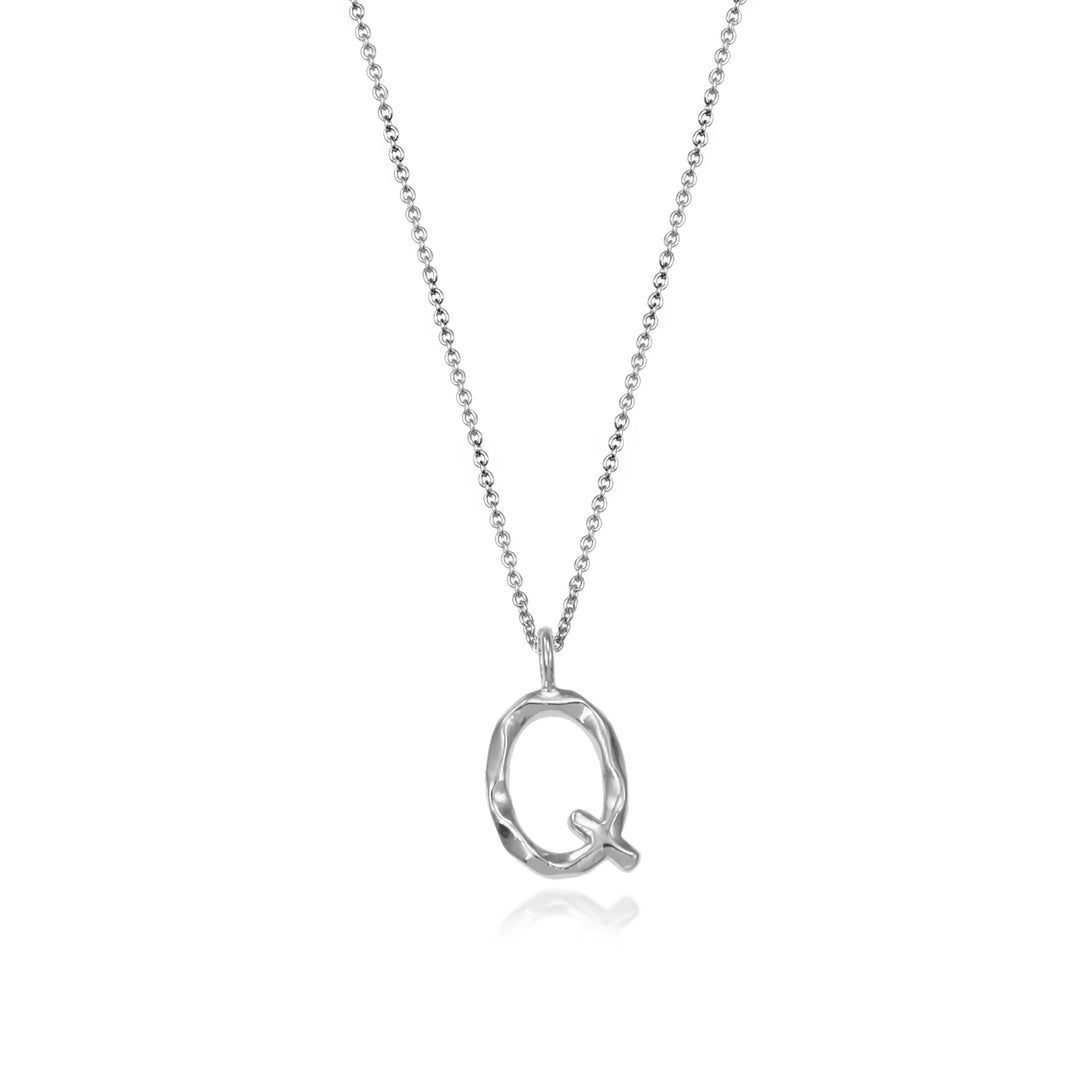 Sterling silver letter Q initial necklace pendant with chain on a white background.