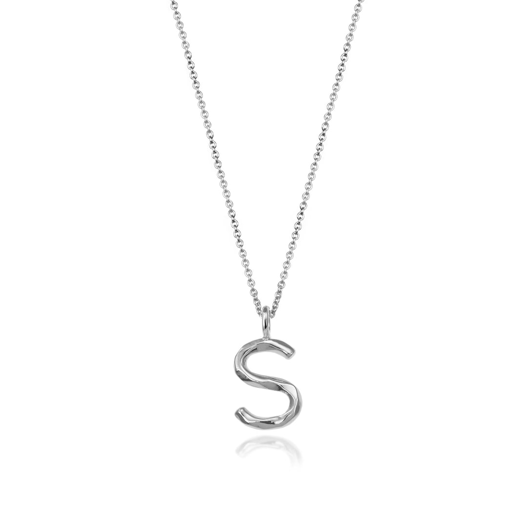 Sterling silver letter S initial necklace pendant with chain on a white background.