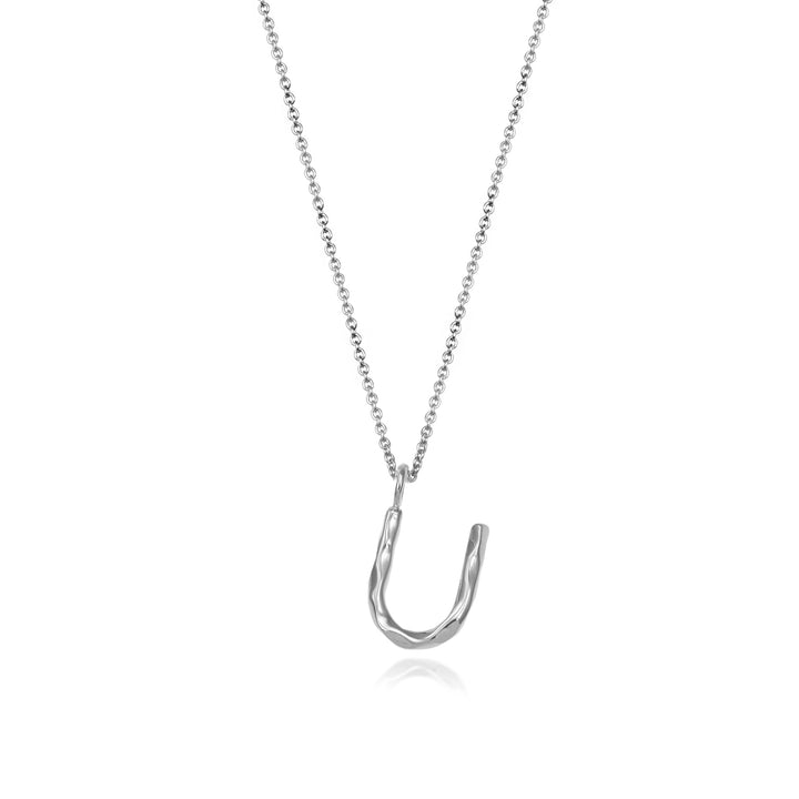 Sterling silver letter U initial necklace pendant with chain on a white background.