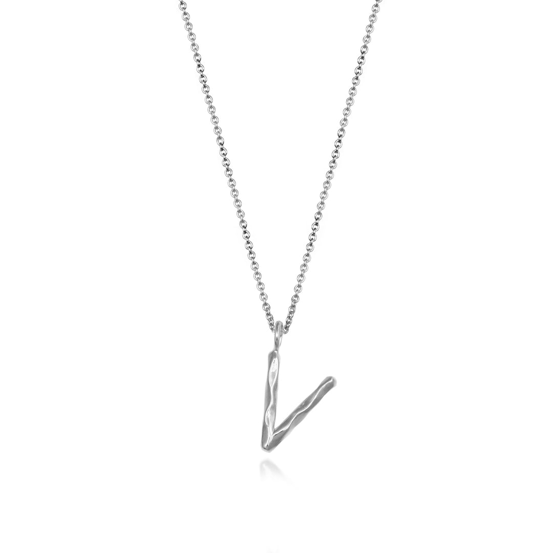 Sterling silver letter V initial necklace pendant with chain on a white background.